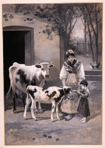 Mujer y niña dando de comer a un ternerillo