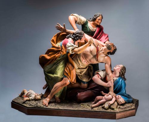 La degollación de los inocentes por Herodes. Mujeres atacando a un verdugo.