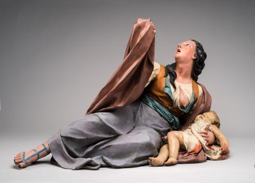 La degollación de los inocentes por Herodes. Mujer con niño.