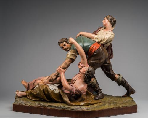 La degollación de los inocentes por Herodes. Mujeres defendiendo a un niño de un soldado.