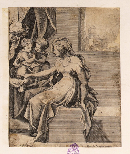 Mujer sentada con dos niños